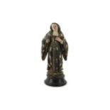 An 18th century Spanish Colonial carved and painted figure of a female saint