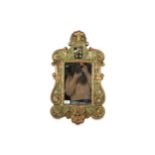 A Continental Baroque style green painted and parcel gilt mirror