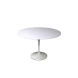 An Eero Saarinen for Knoll International tulip design white circular dining table