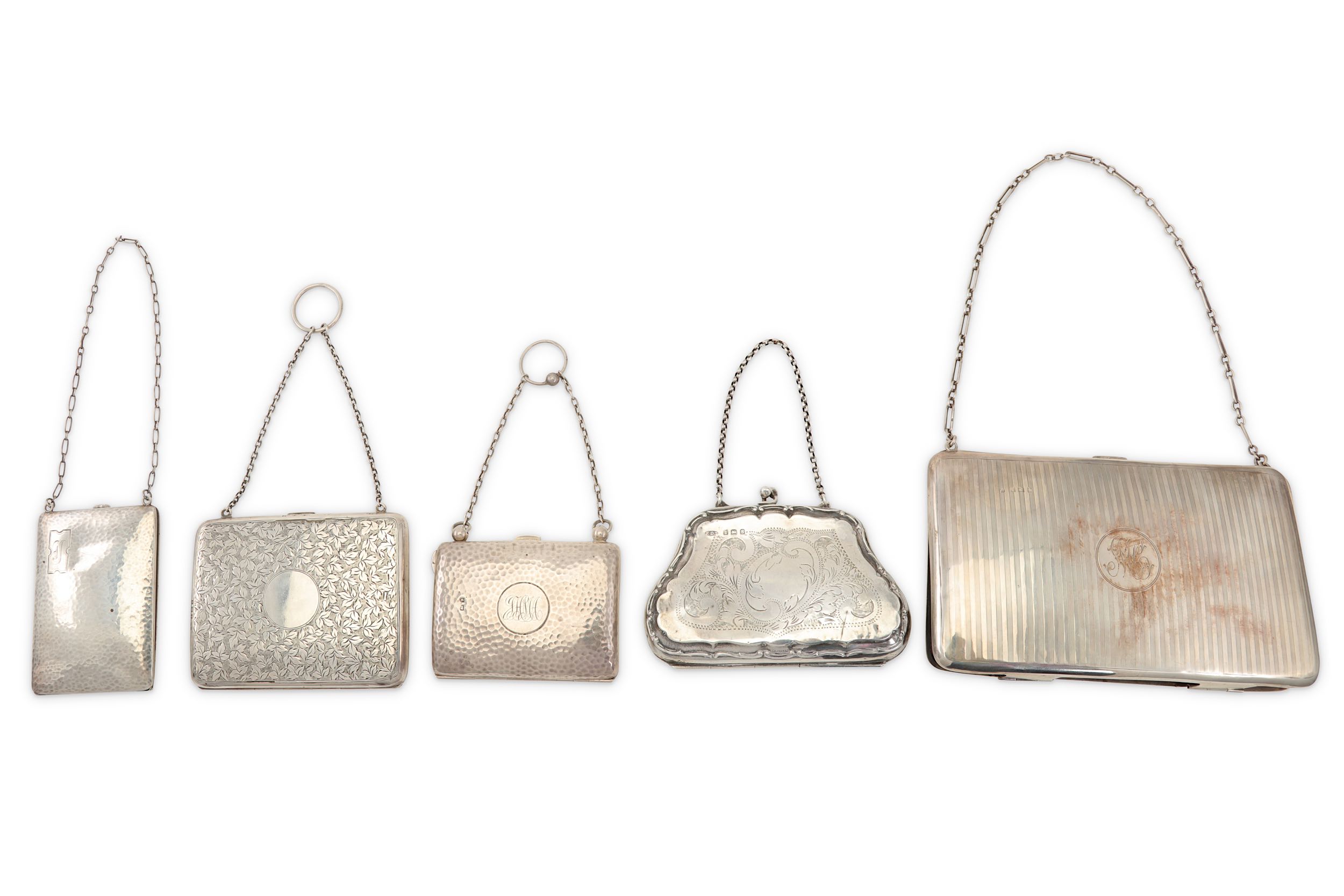 A collection of sterling silver purses