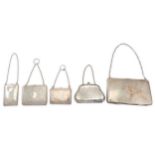 A collection of sterling silver purses