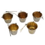 A mixed group of five 20th century Russian Soviet Era silver and silver-gilt tea strainers