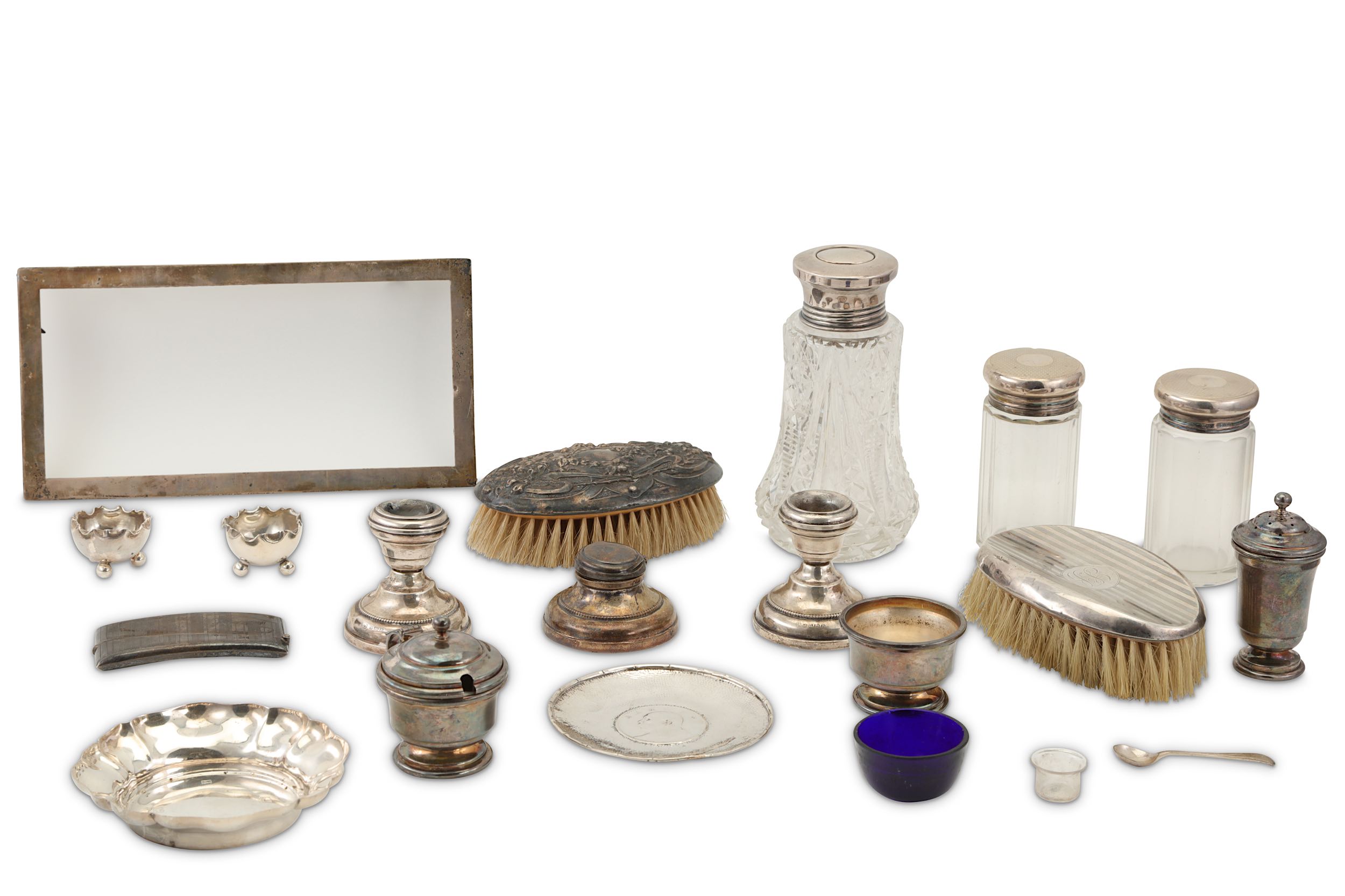 A mixed group of assorted sterling silver items, including a three piece cruet set