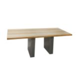 A contemporary ash topped rectangular dining table