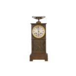 WITHDRAWN - An early 19th century French Empire period patinated bronze mantel clock