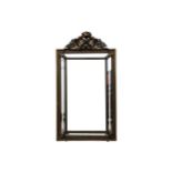 A French 19th century ebonised and parcel gilt cushion framed wall mirror