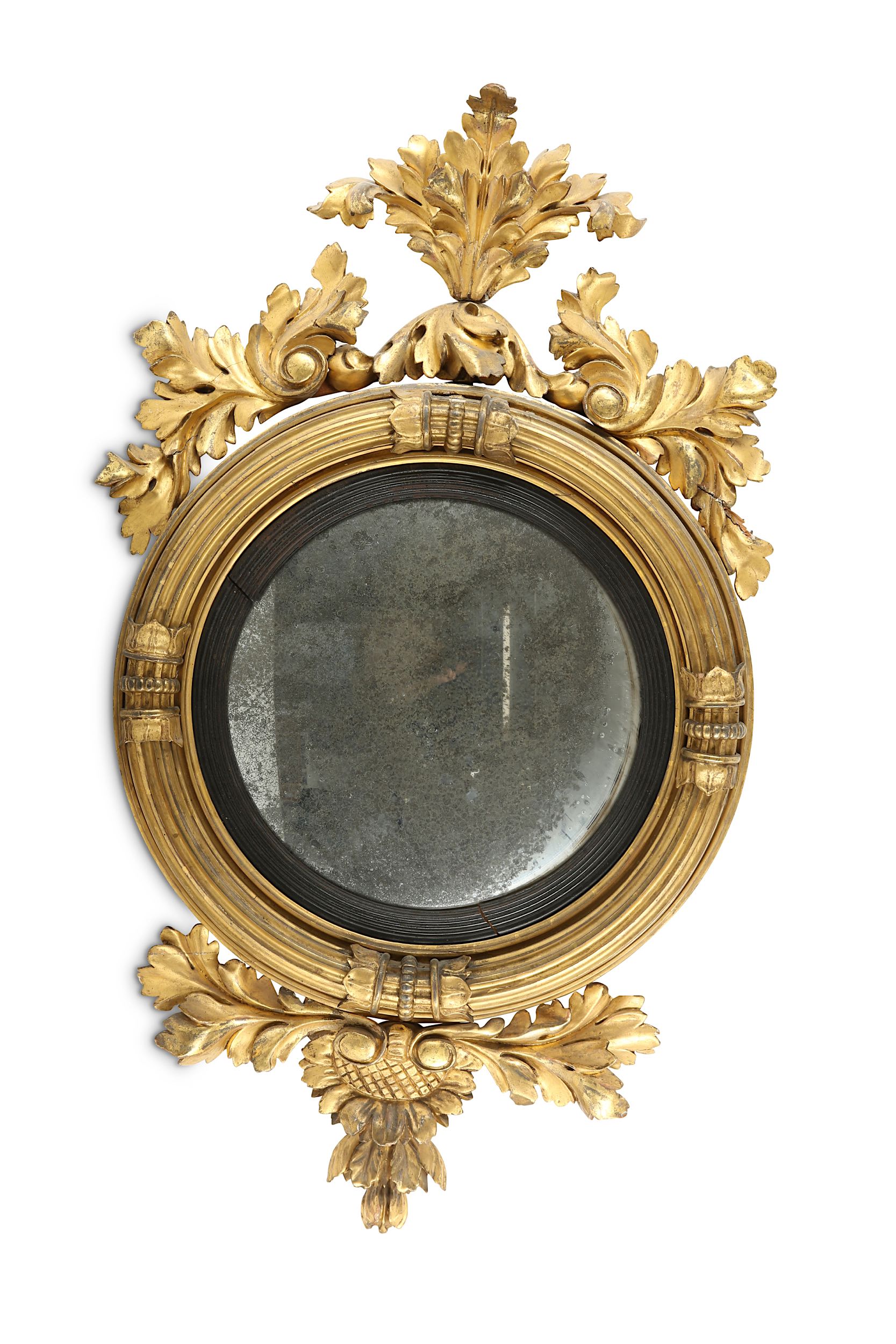 A Regency circular convex mirror with a carved giltwood frame