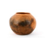 A 1980s large earthenware compressed ovoid studio pottery vase by Penelope Bennett