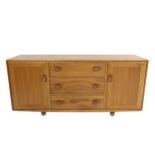 A 1960s Ercol Windsor blonde elm sideboard to a design by Lucian Ercolani