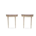 A pair of French cream painted demi lune console tables