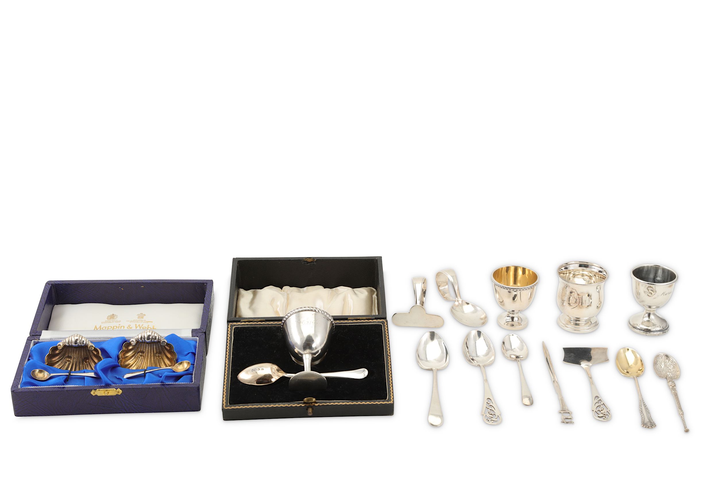 A mixed group of sterling silver items, including a pair of shell form parcel gilt salts and spoons