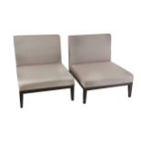 A pair of contemporary lounge chairs,