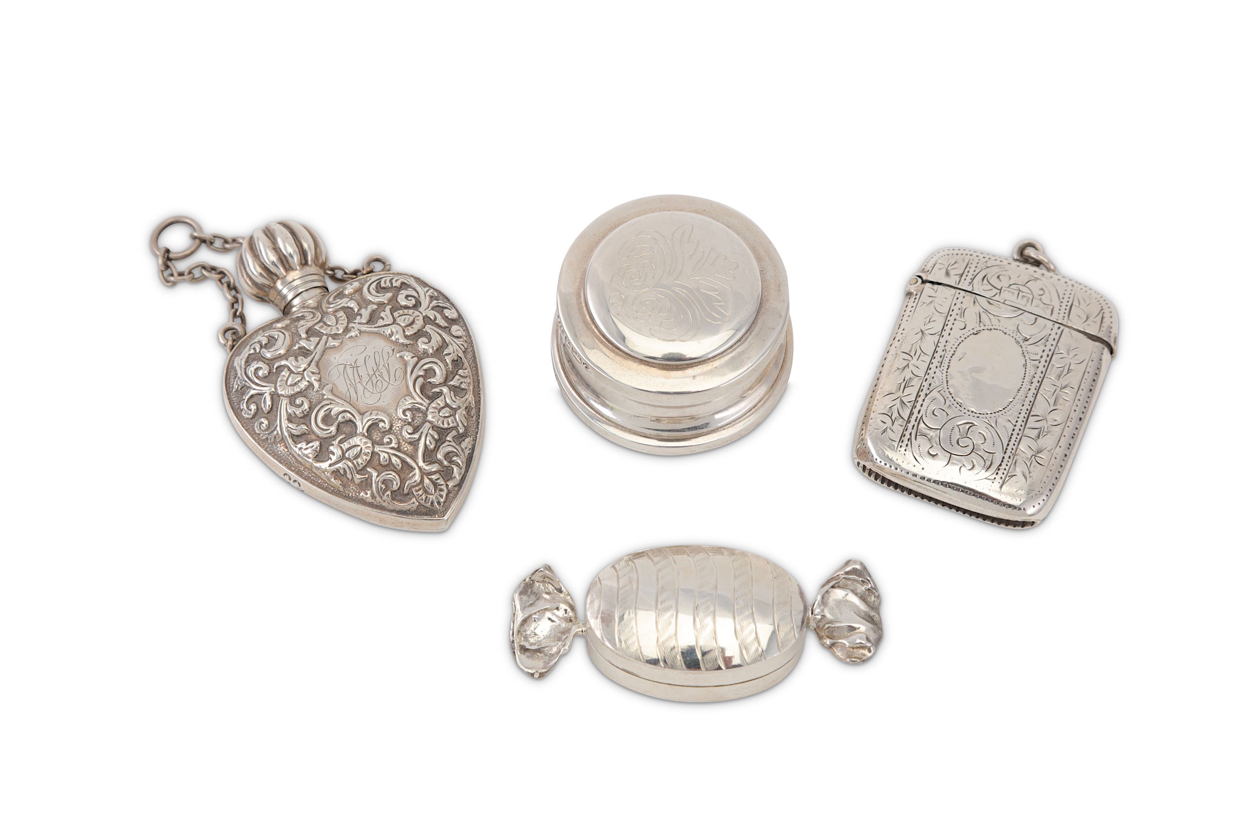 A mixed group of sterling silver objects of Vertu