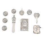 A mixed group of silver objects of Vertu, decorated with cherubs