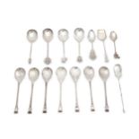 A mixed group of sterling silver spoons, including a matched set of seven Christmas "year spoons"