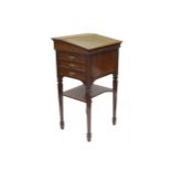 An early 20th century mahogany Davenport style slope top writing or clerks desk