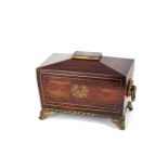 A 19th Century Regency rosewood and brass bound tea caddy