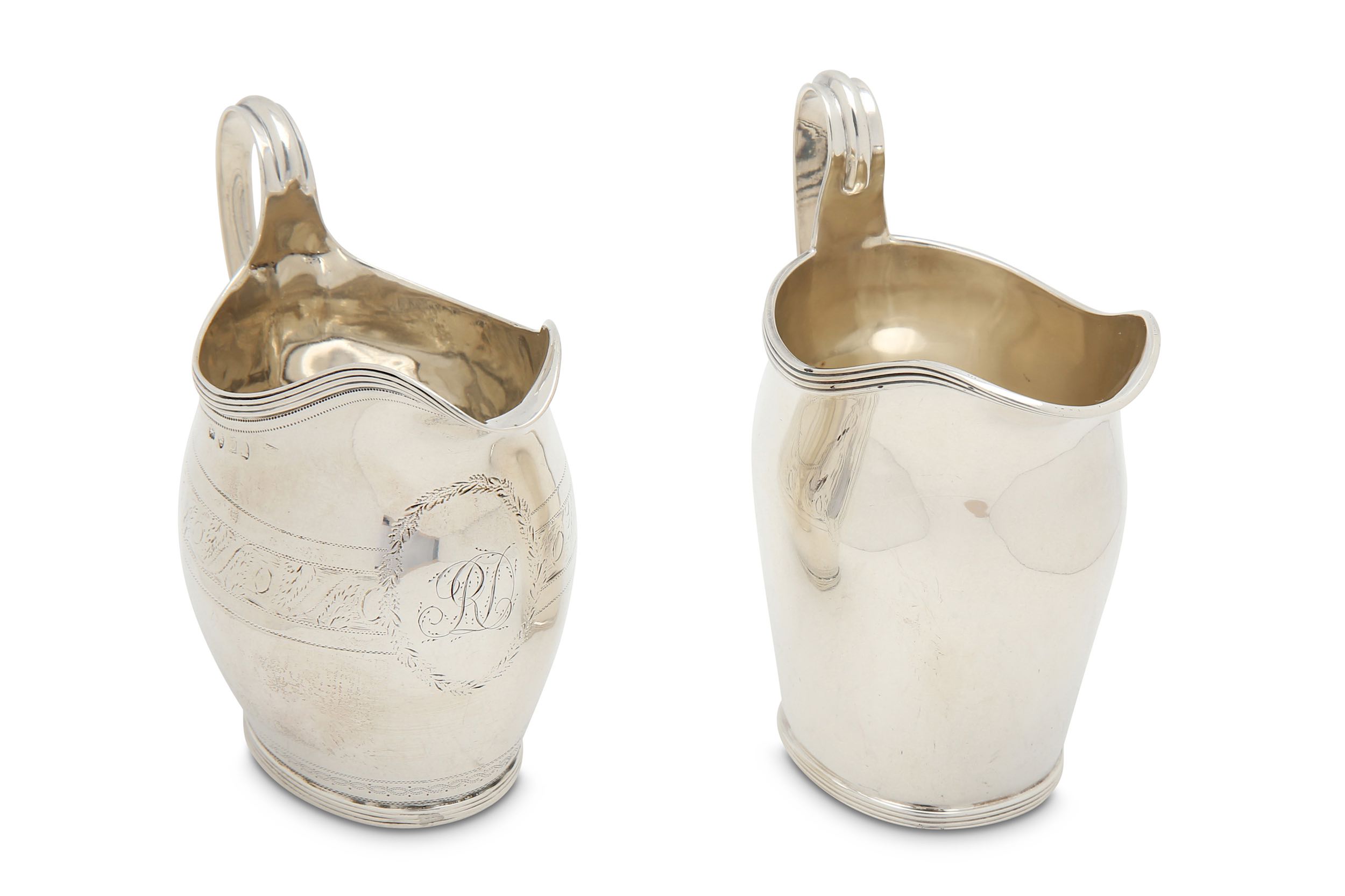 Two sterling silver silver cream jugs, one George III London 1799