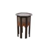 A HARDWOOD EBONISED AND MOTHER OF PEARL INLAID OCCASIONAL TABLE.