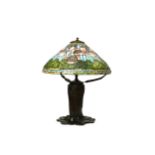 A TIFFANY STYLE BRONZE TABLE LAMP.