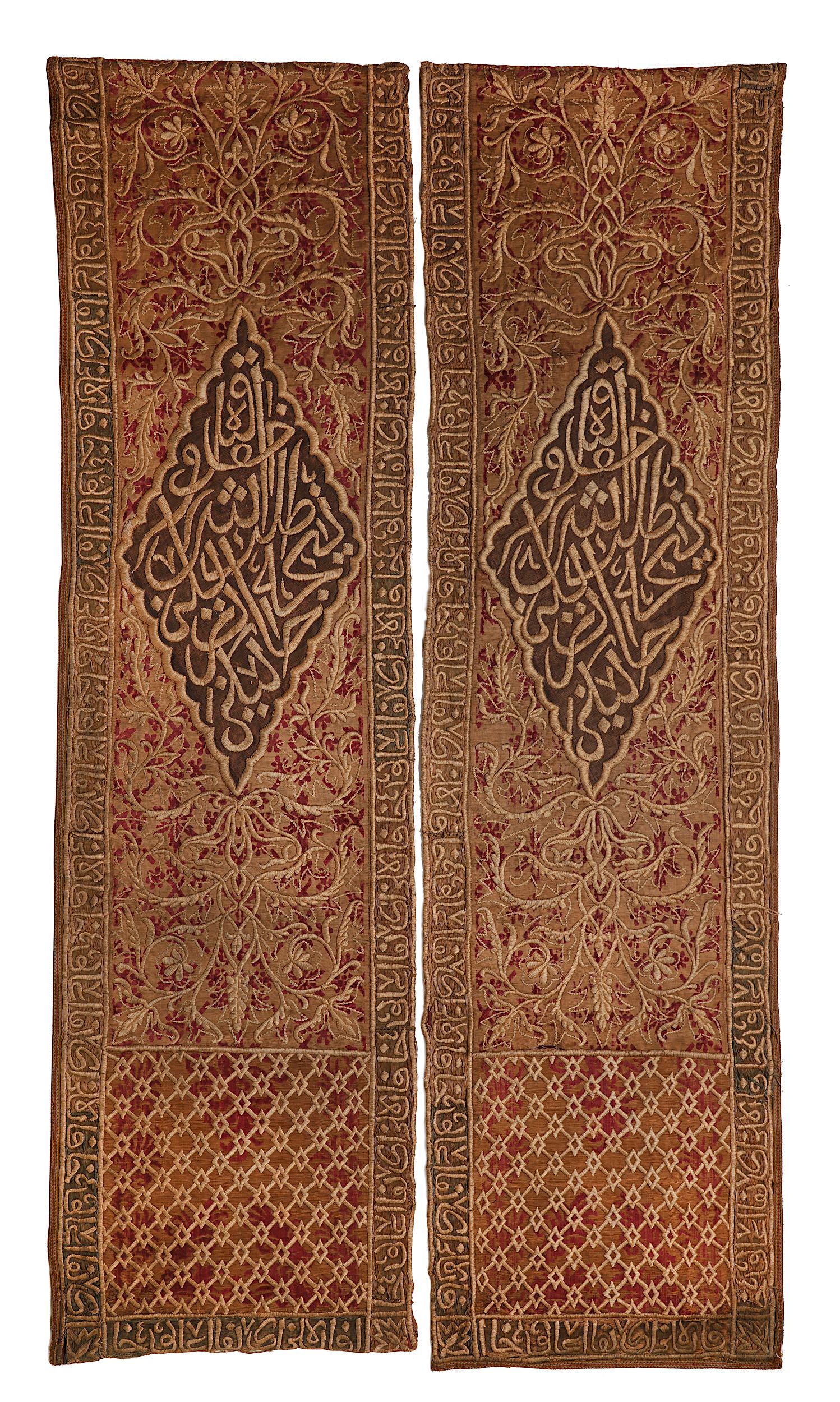 TWO EMBROIDERED VELVET WALL HANGINGS.