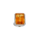 A citrine and diamond ring