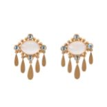 A pair of gem-set earrings, by Kim Poor