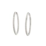 A pair of diamond hoop earrings