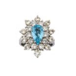 A diamond and blue topaz cluster ring