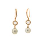 A pair of cultured pearl and diamond earrings