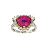 A pink sapphire and diamond ring