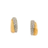A pair of diamond earrings, by Tiffany & Co.