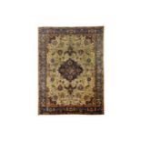 A TABRIZ CARPET, NORTH-WEST PERSIA approx: 12ft.5in. x 9ft.2in.(379cm. x 279cm.) The sandy-beige
