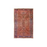 A HERIZ CARPET, NORTH-WEST PERSIA approx: 9ft.5in. x 6ft.6in.(286cm. x 198cm.) The field with
