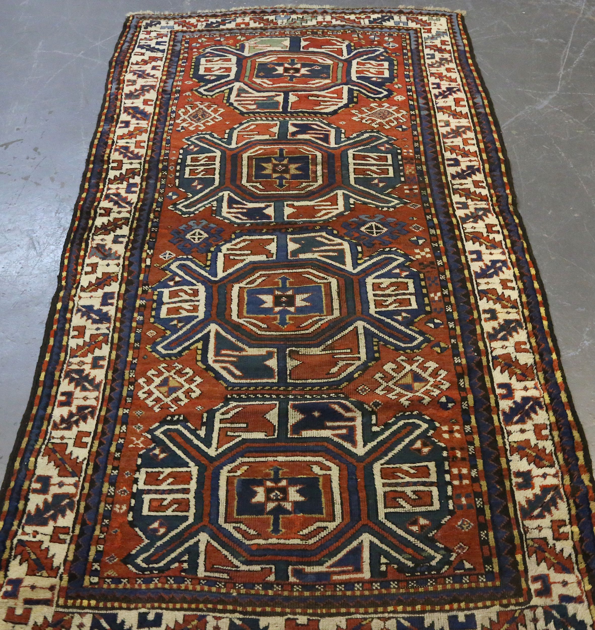 AN ANTIQUE CHELABERD RUG, SOUTH CAUCASUS approx: 7ft.11in. x 3ft.11in.(241cm. x 119cm.) The field - Image 2 of 5