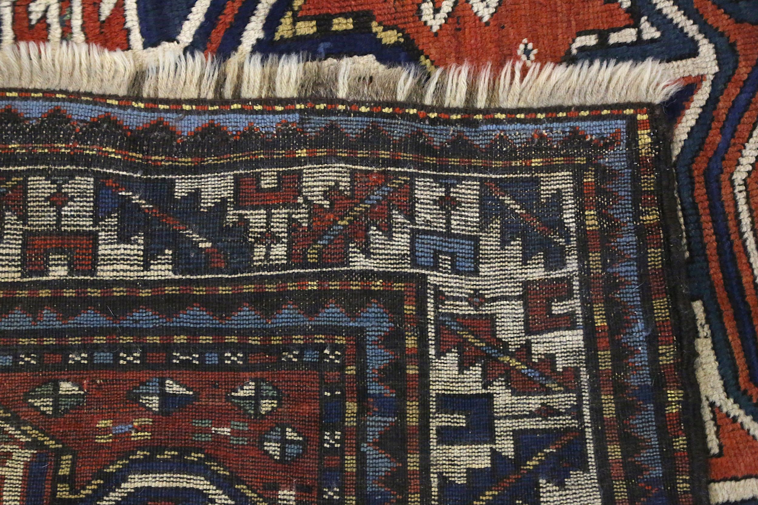 AN ANTIQUE CHELABERD RUG, SOUTH CAUCASUS approx: 7ft.11in. x 3ft.11in.(241cm. x 119cm.) The field - Image 5 of 5