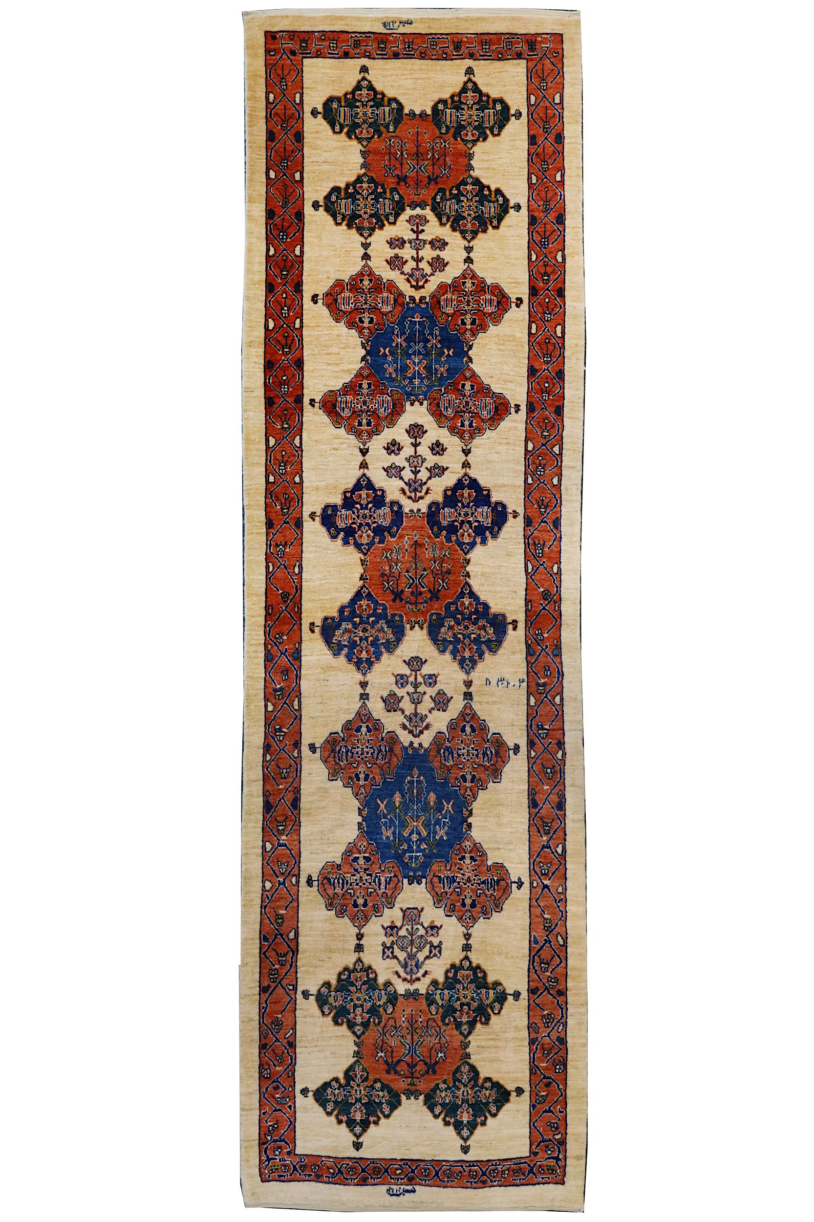 A FINE SIGNED KASHKULI RUNNER, SOUTH-WEST PERSIA approx: 9ft.6in. x 2ft.9in.(289cm. x 84cm.) Very