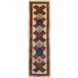 A FINE SIGNED KASHKULI RUNNER, SOUTH-WEST PERSIA approx: 9ft.6in. x 2ft.9in.(289cm. x 84cm.) Very