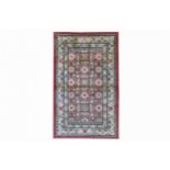 A FINE SILK KHOTAN RUG, EAST TURKESTAN approx: 6ft.10in. x 4ft.1in.(208cm. x 124cm.) The field