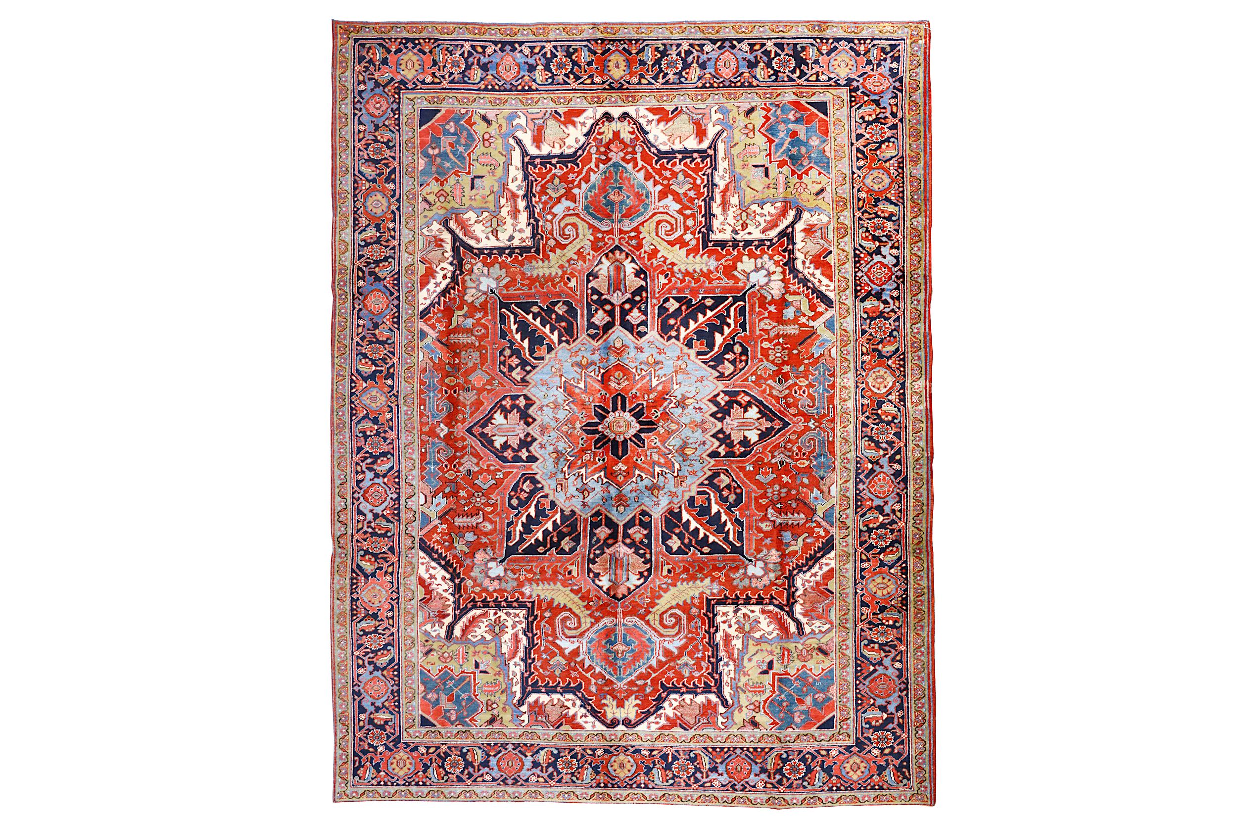 A FINE HERIZ CARPET, NORTH-WEST PERSIA approx: 11ft.3in. x 8ft.6in.(342cm. x 259cm.) The  field with