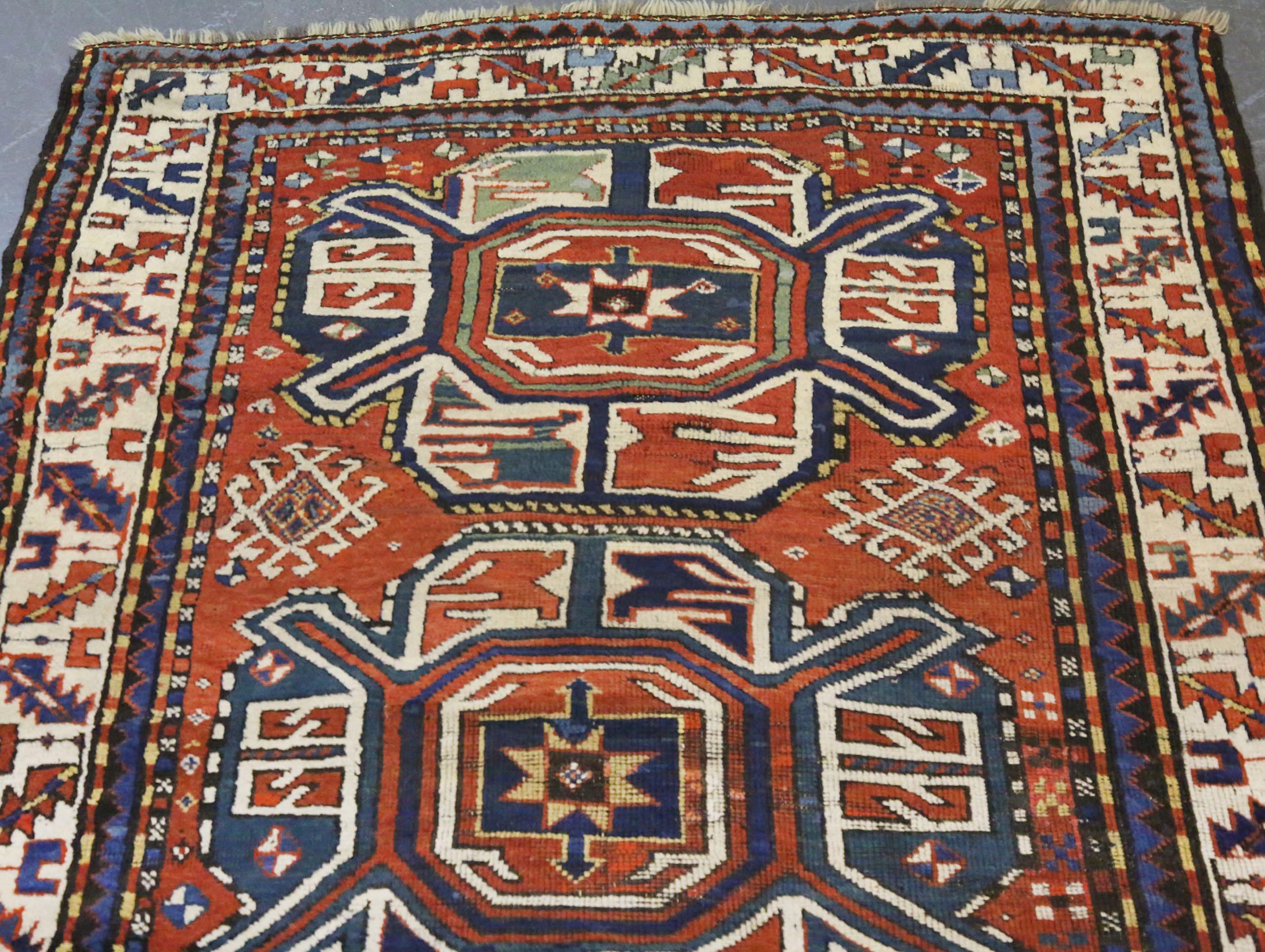 AN ANTIQUE CHELABERD RUG, SOUTH CAUCASUS approx: 7ft.11in. x 3ft.11in.(241cm. x 119cm.) The field - Image 4 of 5