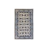 A FINE NAIN RUG, CENTRAL PERSIA approx: 6ft.10in. x 4ft.2in.(208cm. x 127cm.) The ivory field with