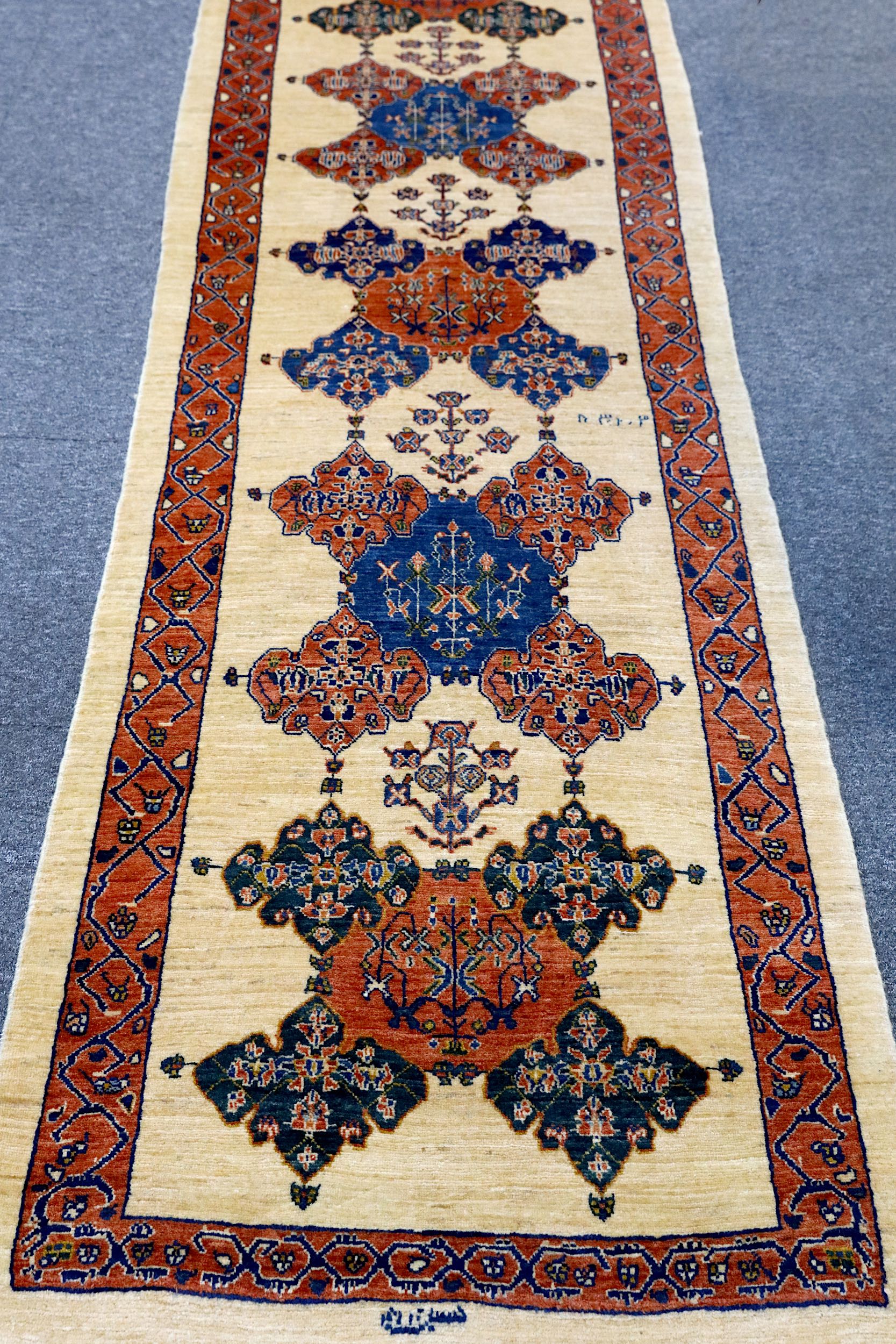 A FINE SIGNED KASHKULI RUNNER, SOUTH-WEST PERSIA approx: 9ft.6in. x 2ft.9in.(289cm. x 84cm.) Very - Image 2 of 9