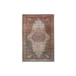A FINE ANATOLIAN CARPET, TURKEY approx: 9ft.11in. x 6ft.8in.(302cm. x 204cm.) The ivory field with