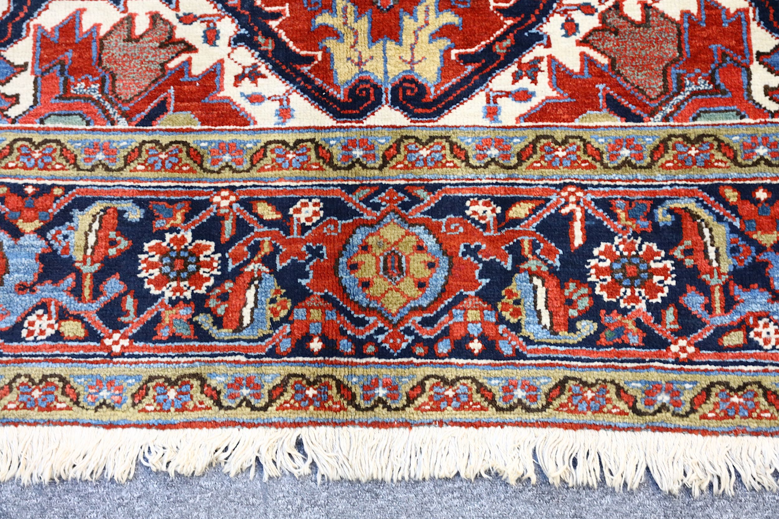 A FINE HERIZ CARPET, NORTH-WEST PERSIA approx: 11ft.3in. x 8ft.6in.(342cm. x 259cm.) The  field with - Image 3 of 5