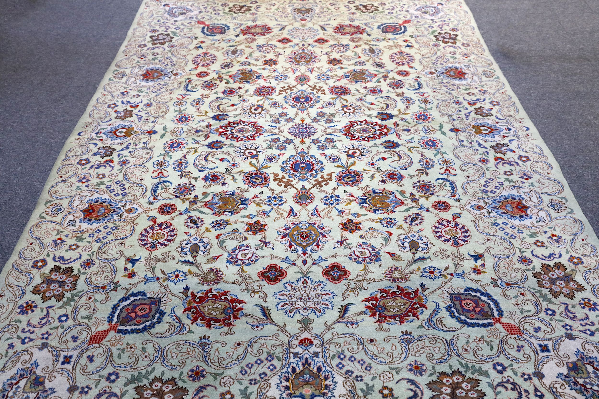 A FINE KASHAN CARPET, CENTRAL PERSIA The shaded light beige field with overall design of various - Image 2 of 6