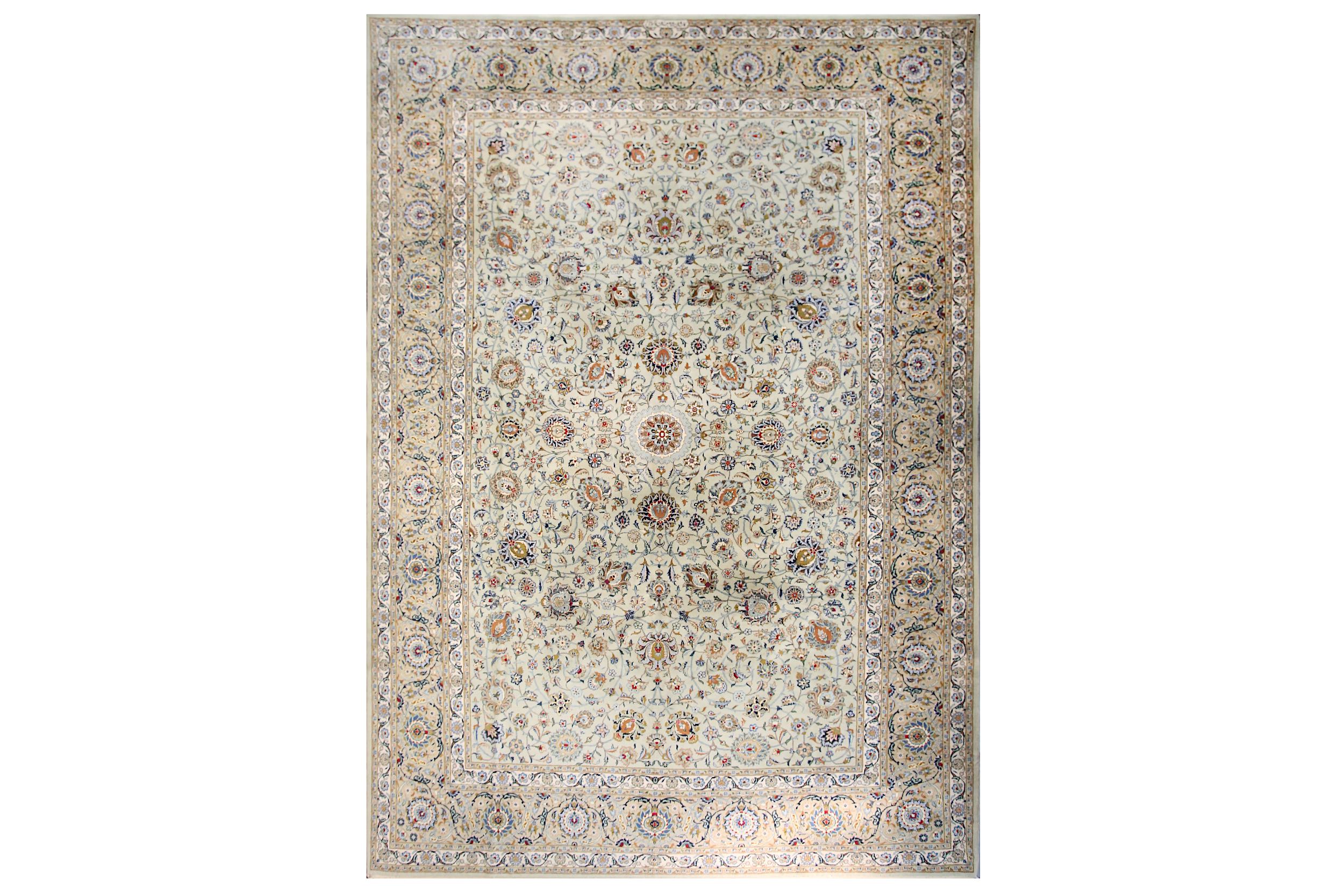 A FINE SGINED KASHAN CARPET, CENTRAL PERSIA approx: 12ft.10in. x 9ft.3in.(392cm. x 281cm.) Very well