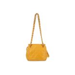 Chanel Yellow Micro Shoulder Bag, c. 1994-96, quilted lambskin leather and gold tone hardware,