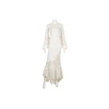 Chanel Cream Crochet and Net Ensemble, Spring 2005, comprising a long sleeved top with flaring