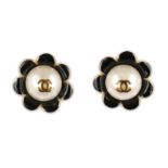 Chanel Flower Head Earrings, 1960s, gilt mounts with black enamel petals and large central faux